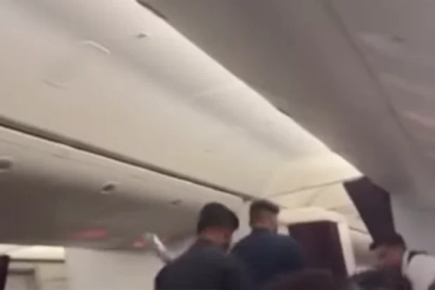 Passengers restrained on flight from Melbourne over ‘threats’