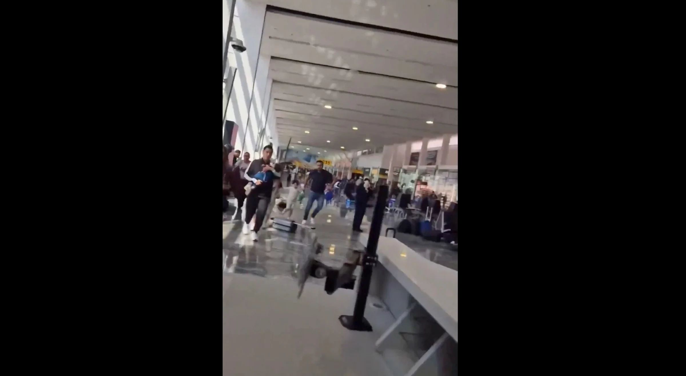 Travelers scramble for safety as Mexican drug cartel attacks major airport following killing of cartel boss