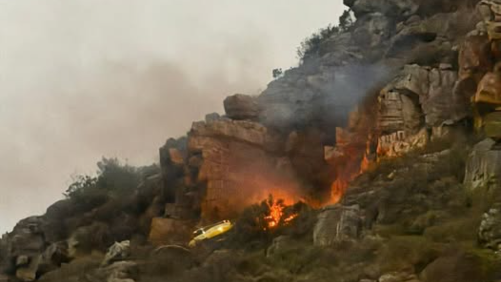 Helicopter crash in Cape Town: Pilot survives amid firefighting efforts