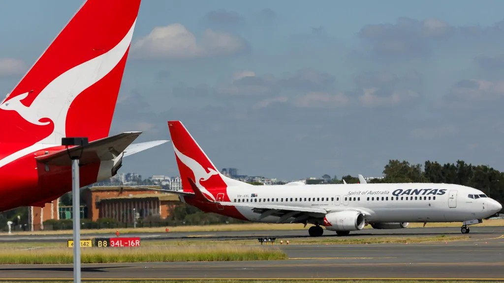 Qantas flight diverted after man bites flight attendant