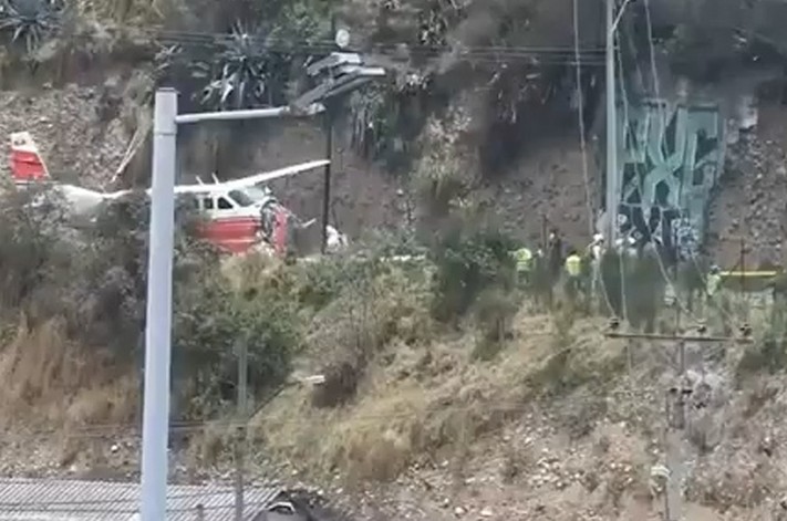 Plane skids off runway, crashes onto road in Ecuador