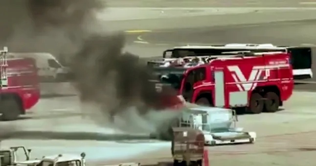 Fire erupts in baggage container after being unloaded from British Airways flight 