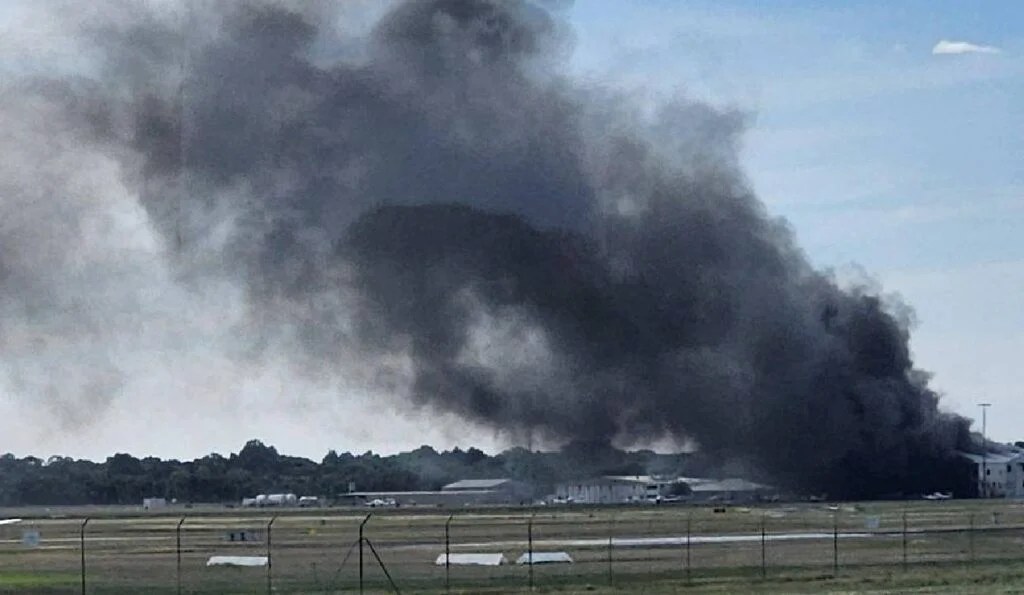 Two dead after small plane crashes into Australia airport hangar
