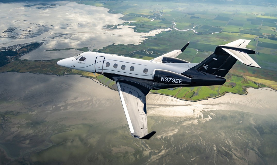 Embraer unveils upgraded Phenom 300EV light business jet